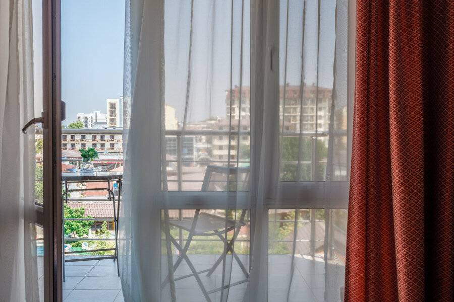 Фотографии номера 2 взрослых + 2 детей в Отеле Омега Витязево